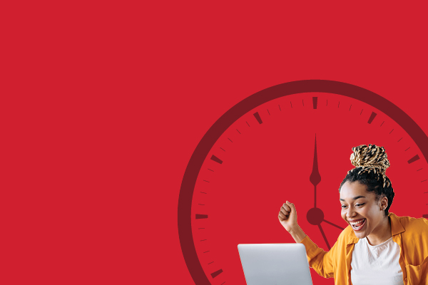 Student on a laptop with a red background