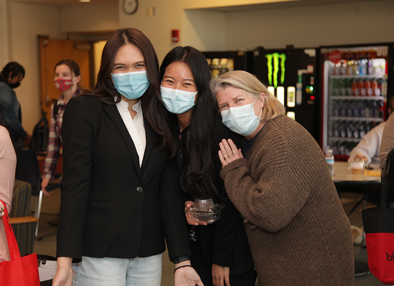 Nursing students posing with BHCC staff member
