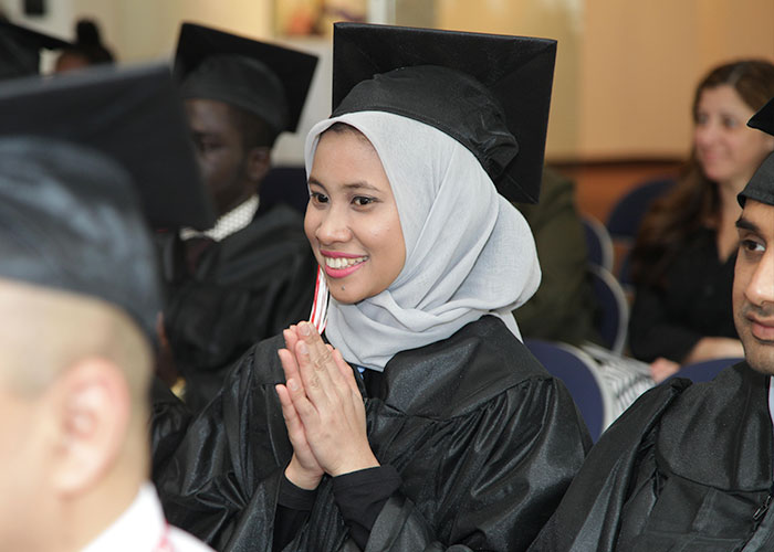 smiling student in audience