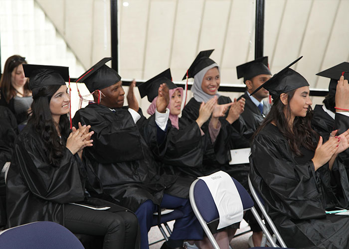 graduates clapping in audience