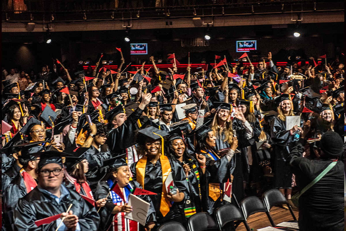 students celebrating commencement