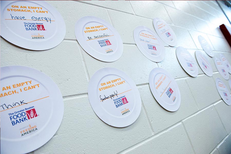 plates on wall displaying student hunger issues