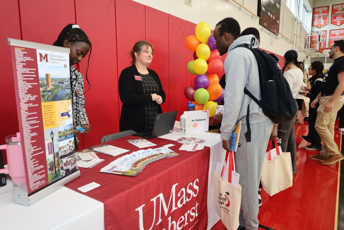 College rep speaking to a student