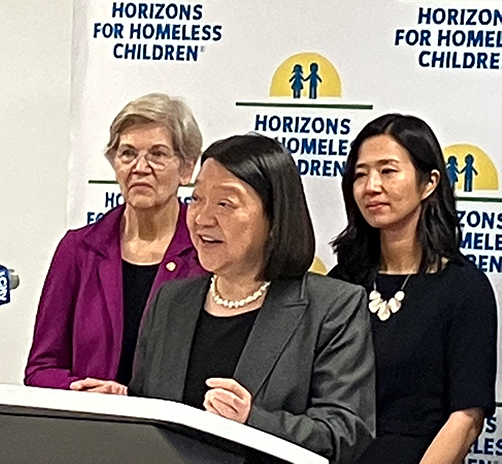 Senator Warren, Pam Eddinger and Mayor Wu at a press conference podium
