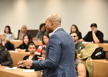 Wes Moore talking to students