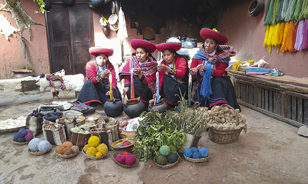2016 Student Photo Contest 1st Place Winner:  Spin Me a Yarn; Chincheros, Peru
Photo by Jared Huynh.  Four Quechua women demonstrate traditional methods of
dyeing hand-spun alpaca wool without synthetic colors.