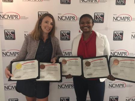 Brooke and Virginia posing with BHCC's 2017 NCMPR awards